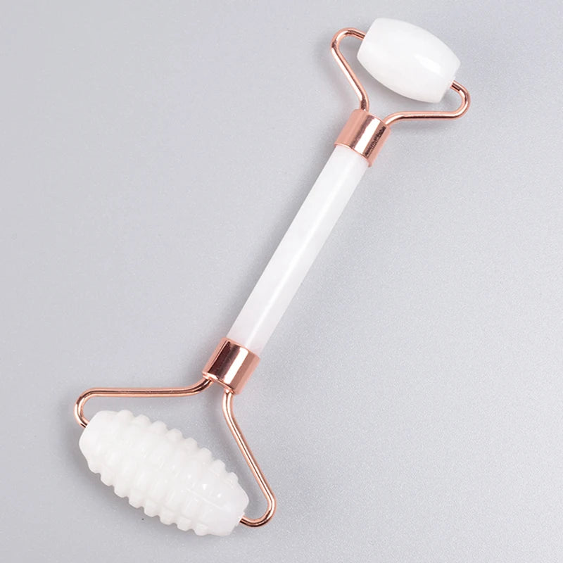 Set Rodillo Facial Dentado y Gua Sha de Jade Oro Rosa