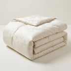 Nórdico de seda de morera blanco roto doblado, con tejido jacquard